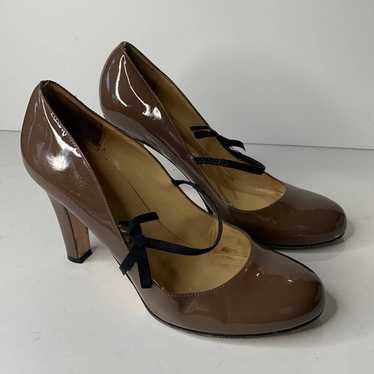 Kate Spade tan patent leather black bow tie pumps - image 1
