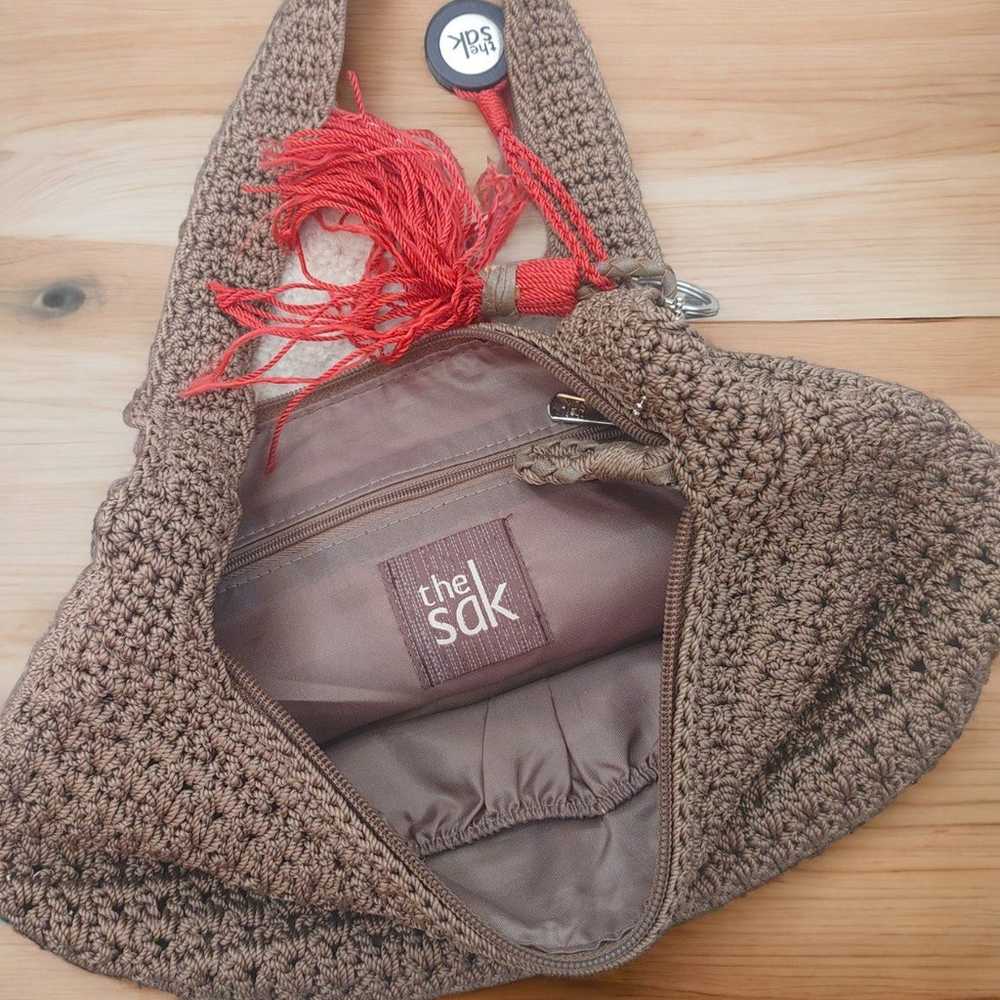 The Sak crochet light brown bag purse with tassel - image 1
