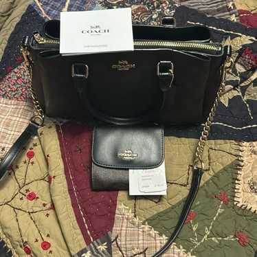Coach signature and wallet in new condition - image 1
