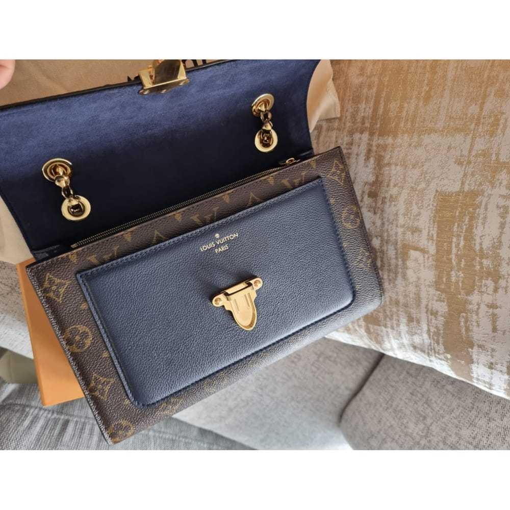 Louis Vuitton Victoire leather handbag - image 6