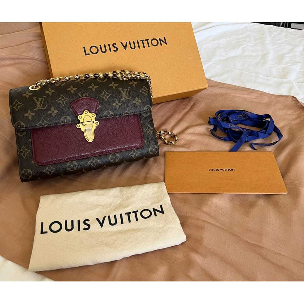 Louis Vuitton Victoire leather handbag - image 4