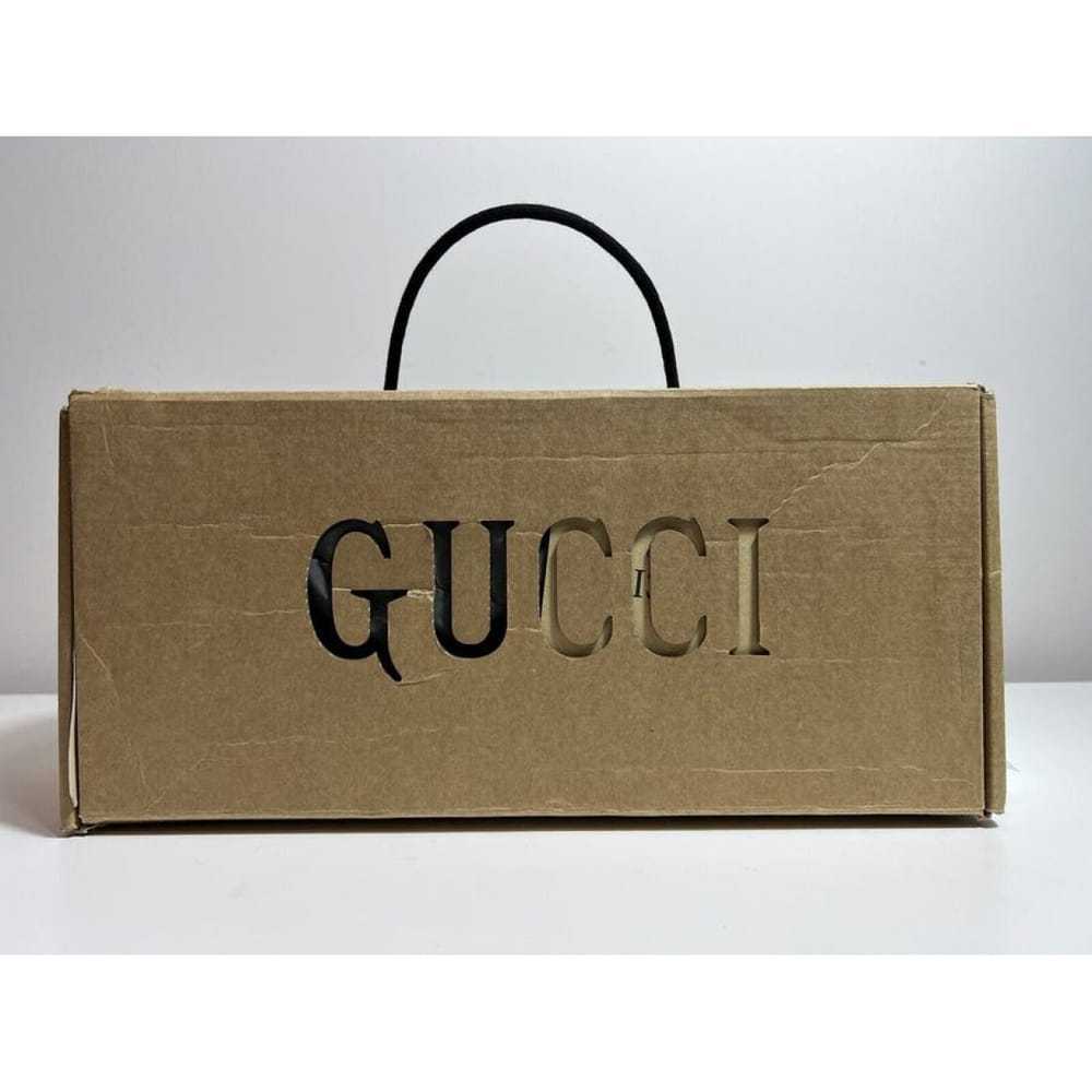 Gucci Cloth flip flops - image 11