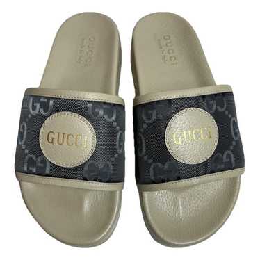 Gucci Cloth flip flops - image 1