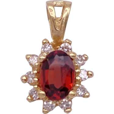 Garnet and Diamond Halo Pendant .68 Carat TGW 14K… - image 1