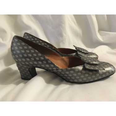 Mademoiselle Grey Silver Novelty Fleur De Lys Heel