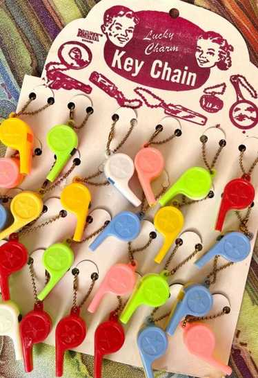 deadstock 50s lucky charm whistle keychains
