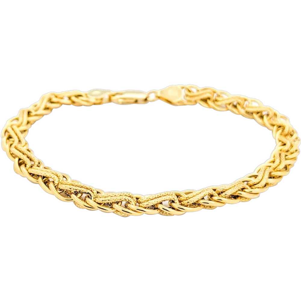 Braided Link Design Bracelet In Yellow Gold - image 1