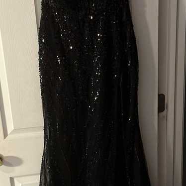 Prom dress: black beaded prom dress with slit