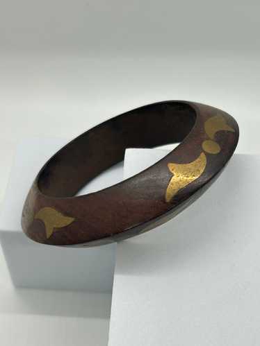 Wood cuff with brass inlay