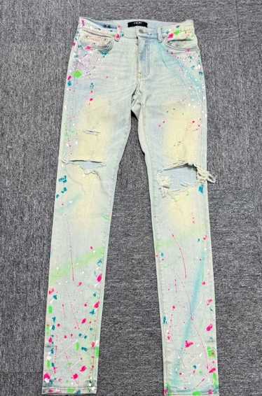 Amiri Amiri blue splash-ink jeans with holes