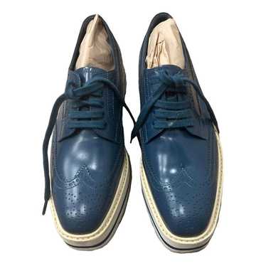 Prada Monolith leather lace ups