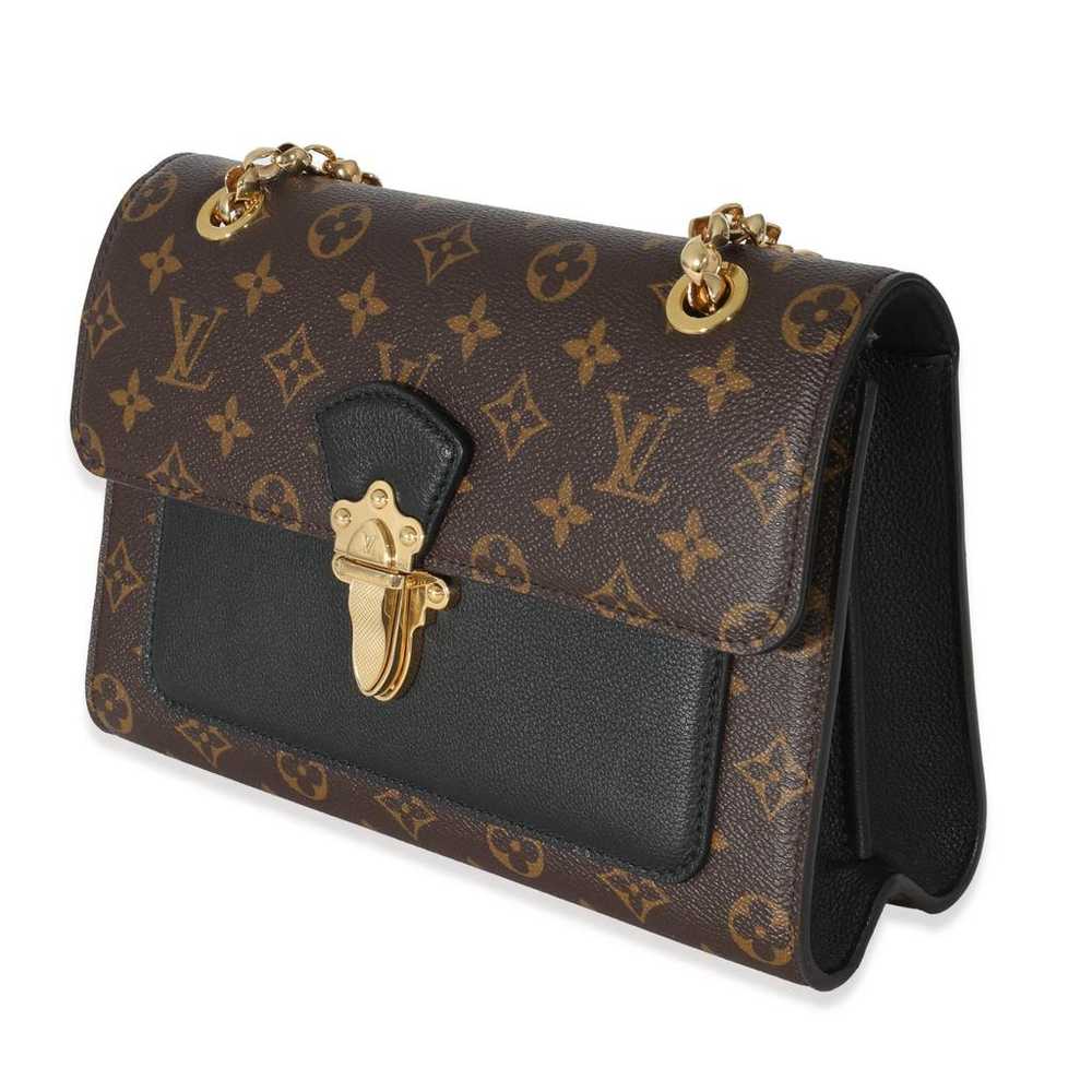 Louis Vuitton Victoire leather handbag - image 2