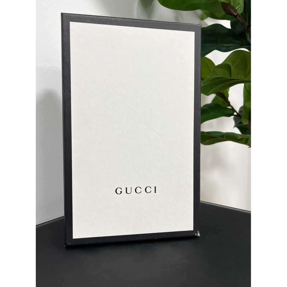 Gucci Brixton leather flats - image 11