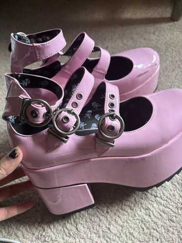 Dolls Kill Baby pink buckled platforms