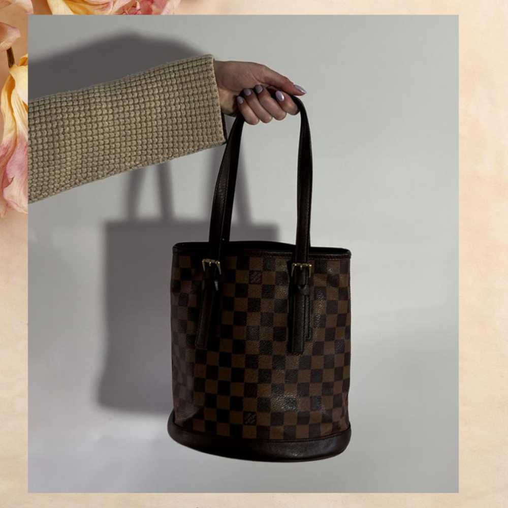 Louis Vuitton Bucket patent leather handbag - image 10