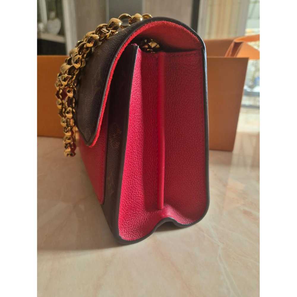 Louis Vuitton Victoire leather handbag - image 9