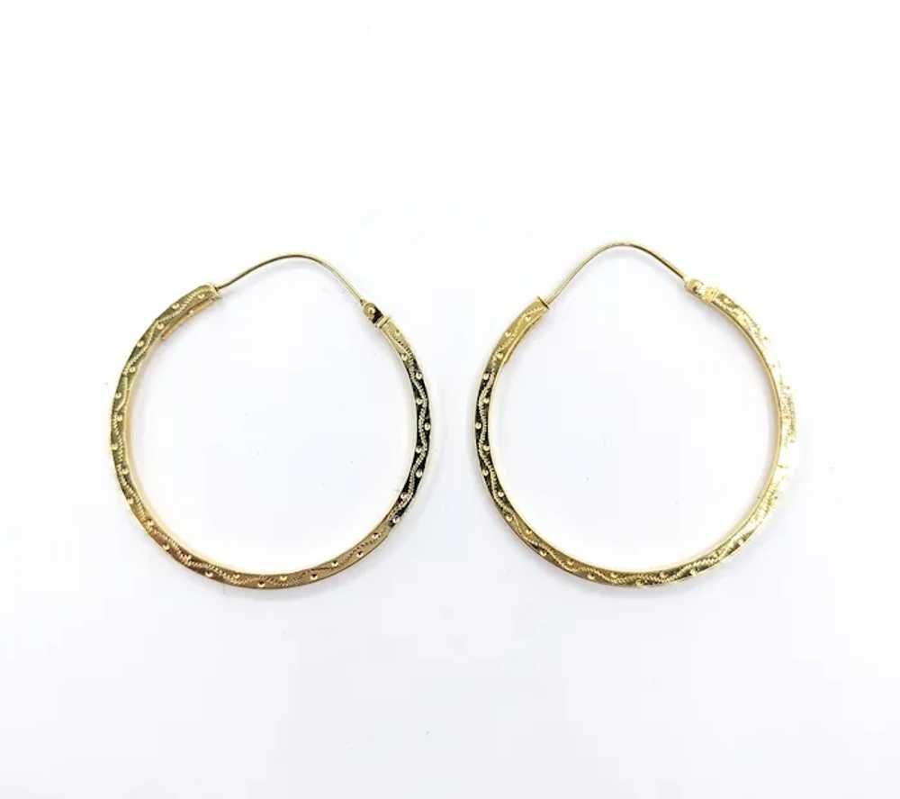 Classic Hoop Earrings In Yellow Gold - image 3