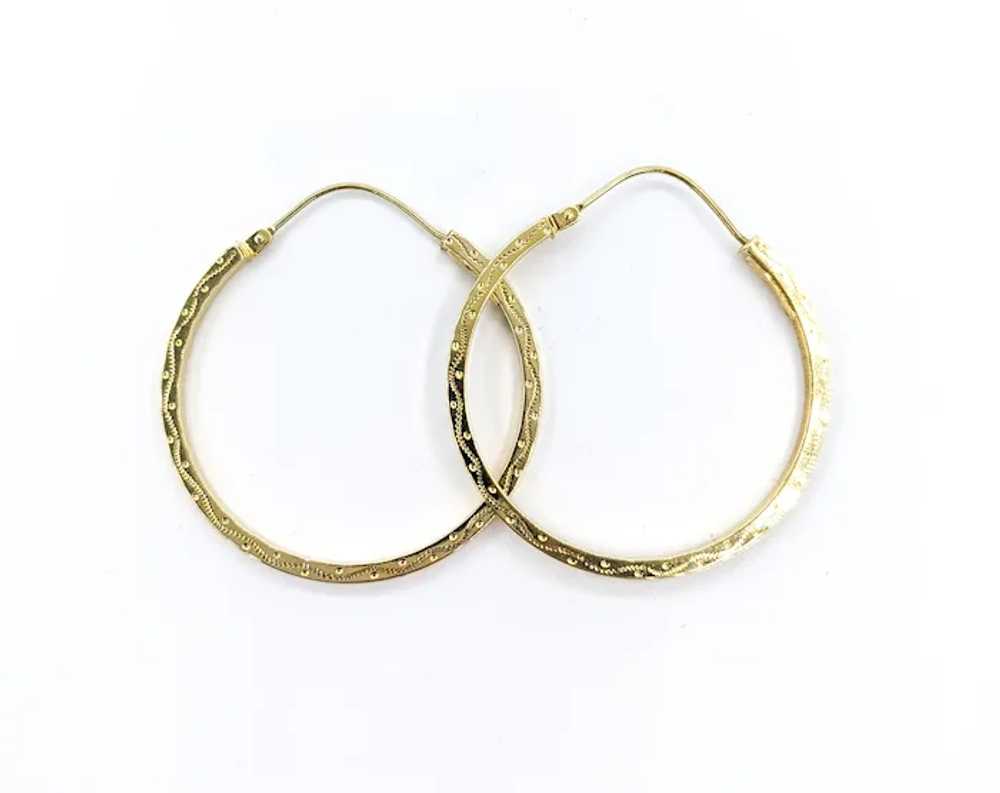 Classic Hoop Earrings In Yellow Gold - image 4