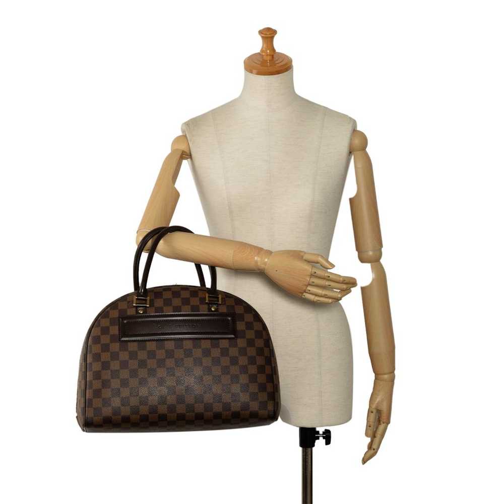 Louis Vuitton Nolita leather handbag - image 12