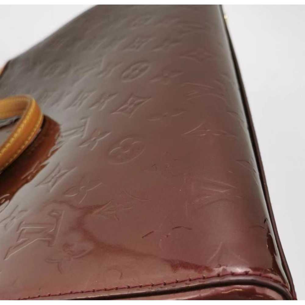 Louis Vuitton Bréa patent leather handbag - image 11