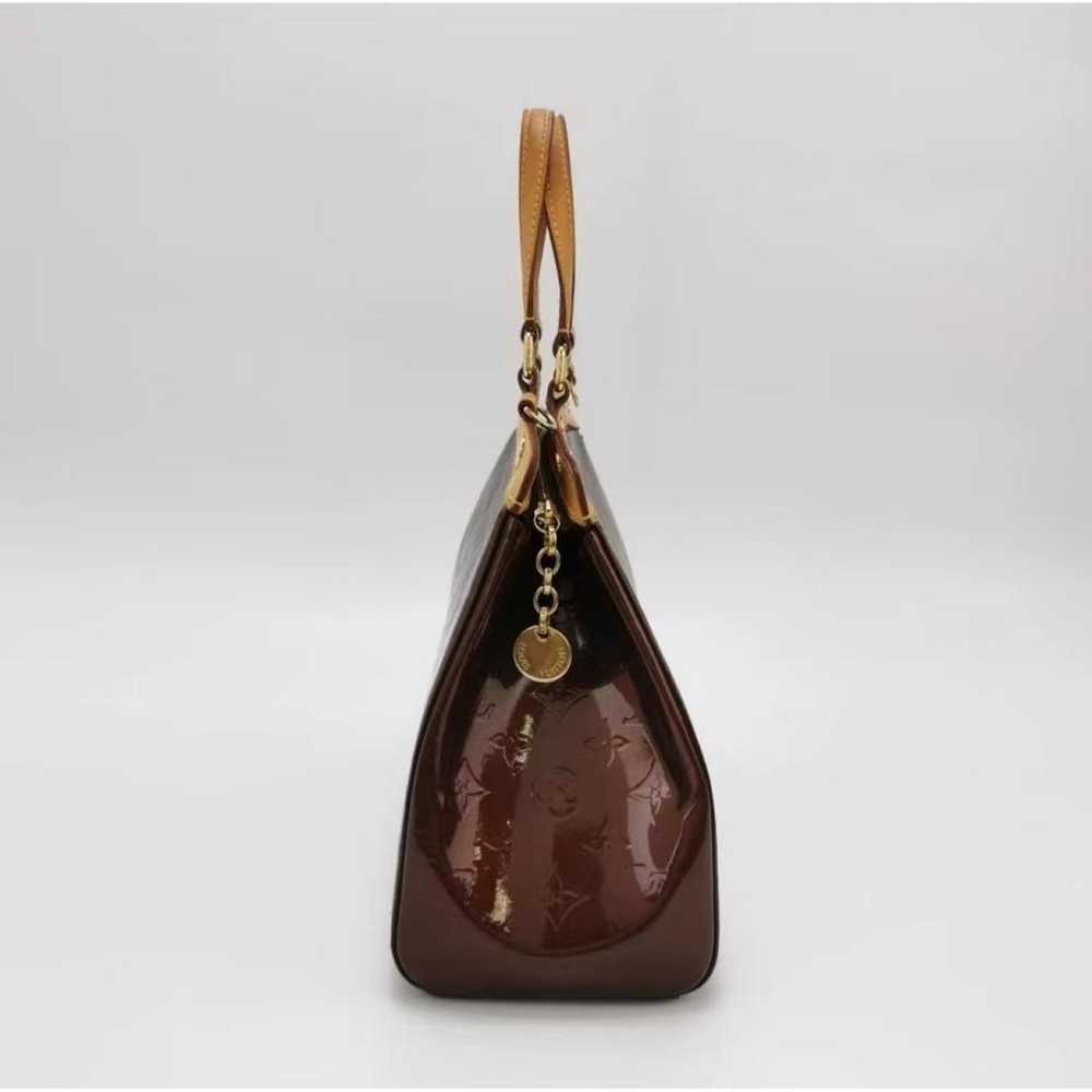 Louis Vuitton Bréa patent leather handbag - image 9