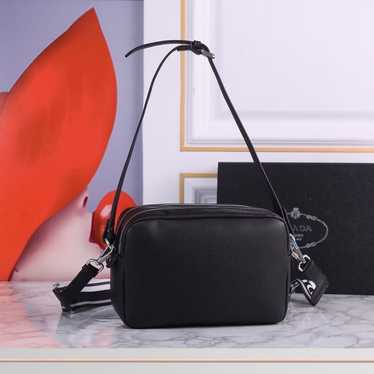 Crossbody bag in black cowhide leather - image 1