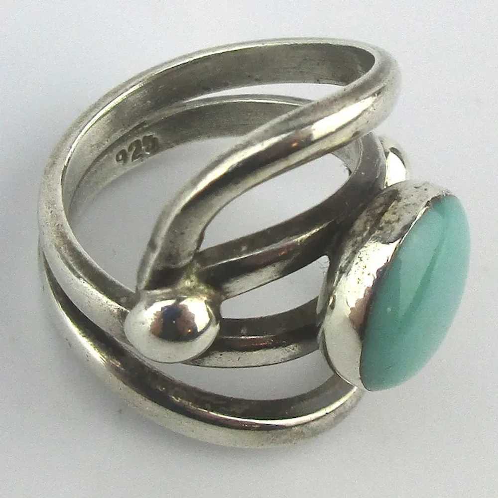 Sterling Silver Ring Hugs Around Turquoise Stone - image 2