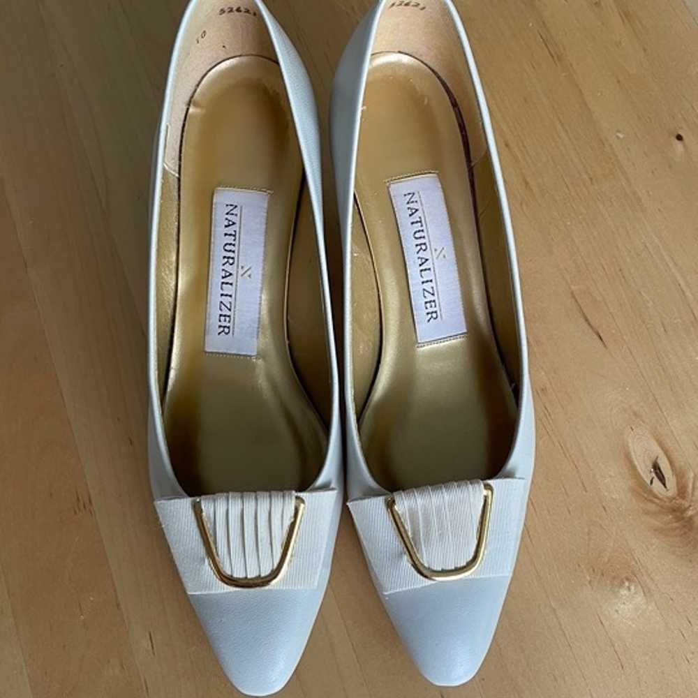 the iconic white heels