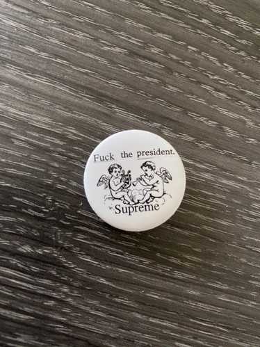 Supreme Fuck the president pin
