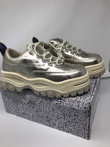 Eytys Eytys Angel Platform Sneakers in Gold Patent