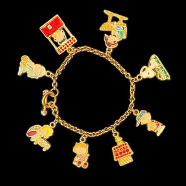 THE DANBURY MINT PEANUTS CHARMS BRACELET GOLD WIT… - image 1