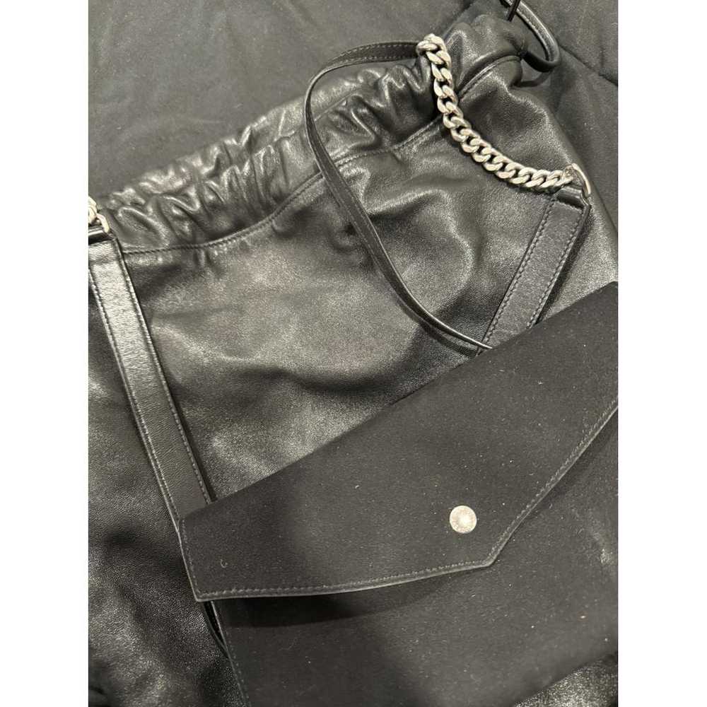 Saint Laurent Monogram bucket leather handbag - image 4