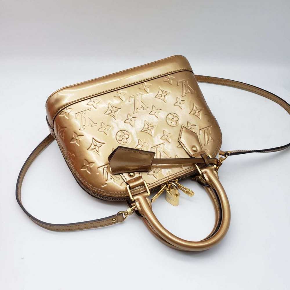 Louis Vuitton Alma Bb patent leather handbag - image 12