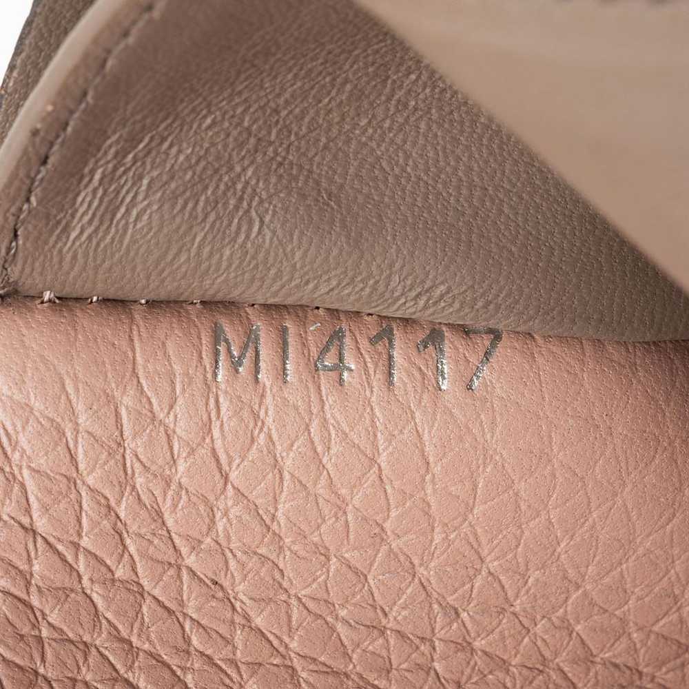 Louis Vuitton Capucines leather wallet - image 4