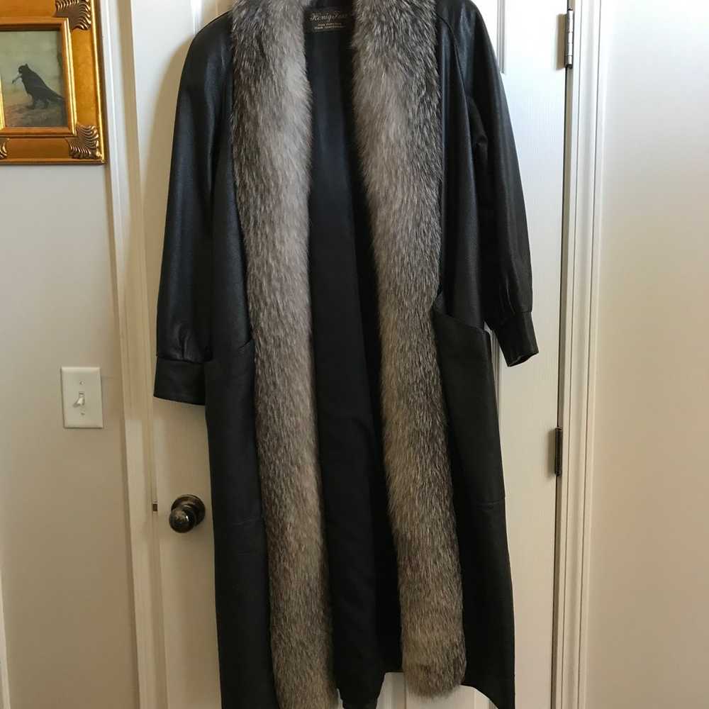 Leather coat with fur trim - image 1