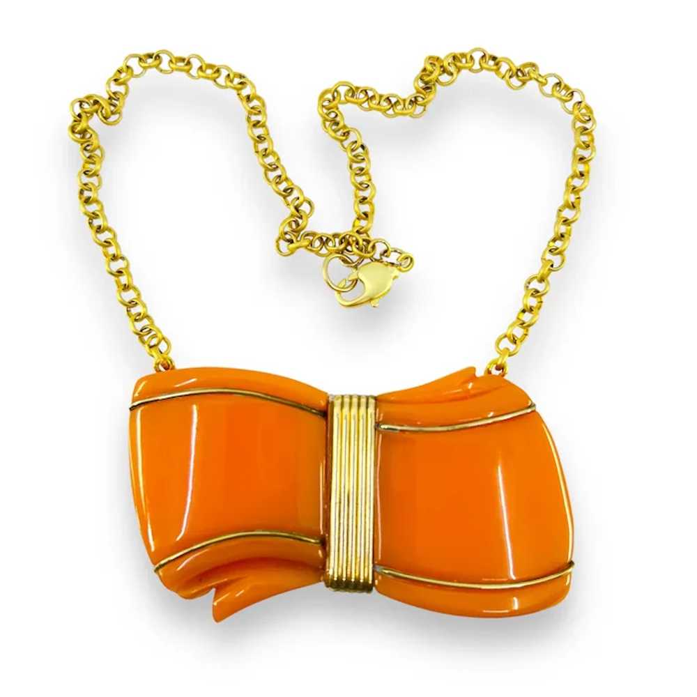Bow Necklace, Orange Bakelite with Brass Trim - image 2