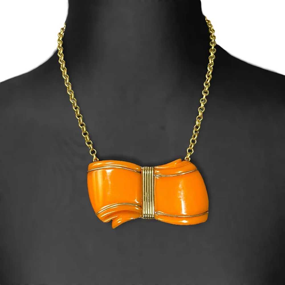 Bow Necklace, Orange Bakelite with Brass Trim - image 3