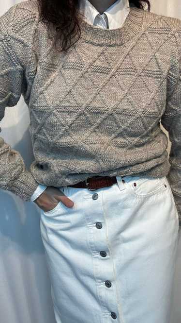 Hand-knitted woolen ecru beige sweater