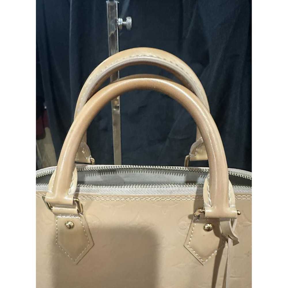 Louis Vuitton Alma patent leather handbag - image 6