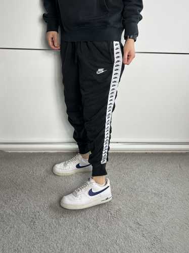 Nike Pants Nike multi logo lampas black
