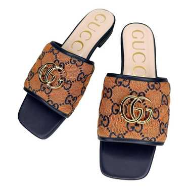 Gucci Double G leather mules