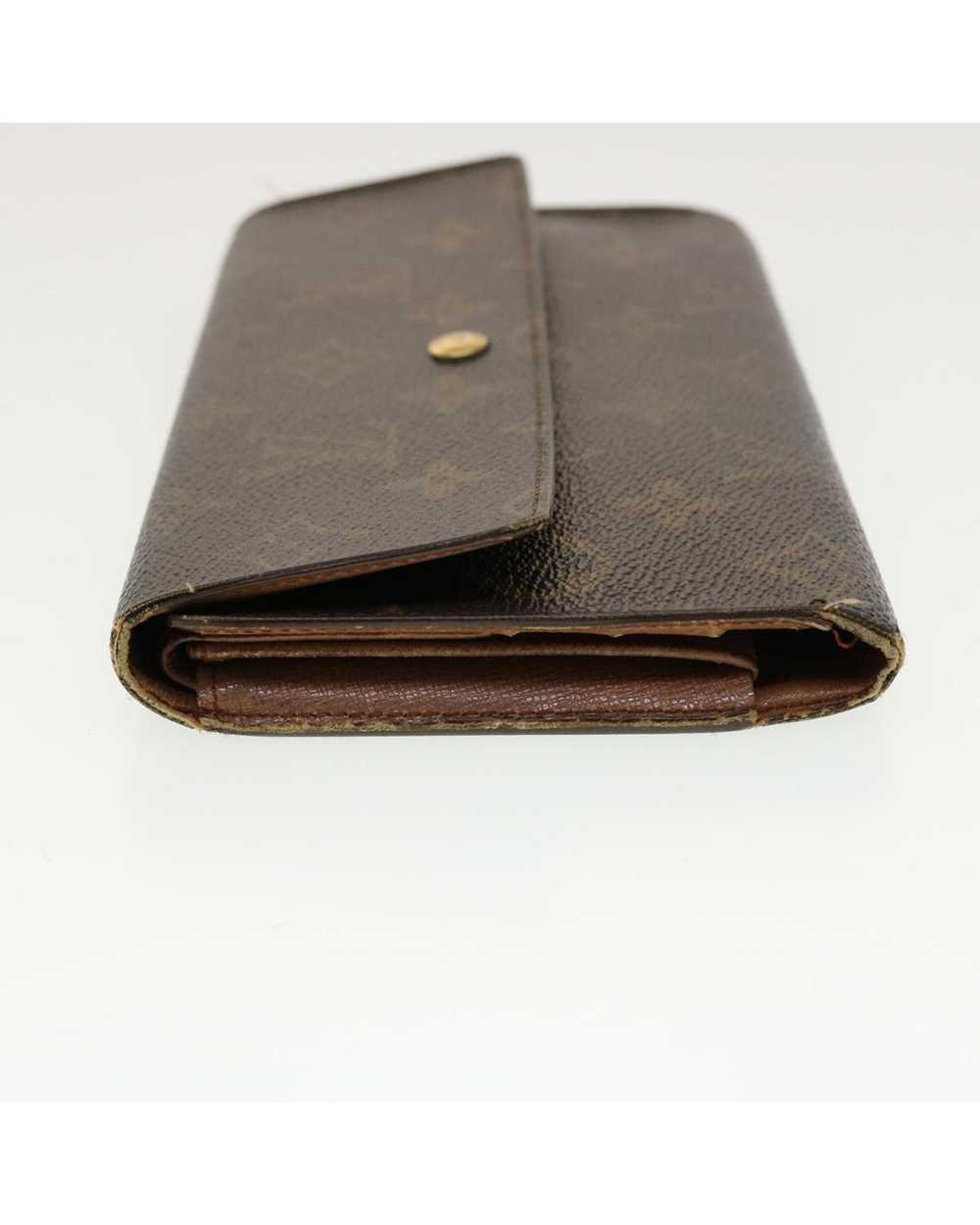 Louis Vuitton Monogram Long Wallet with Clasp But… - image 4