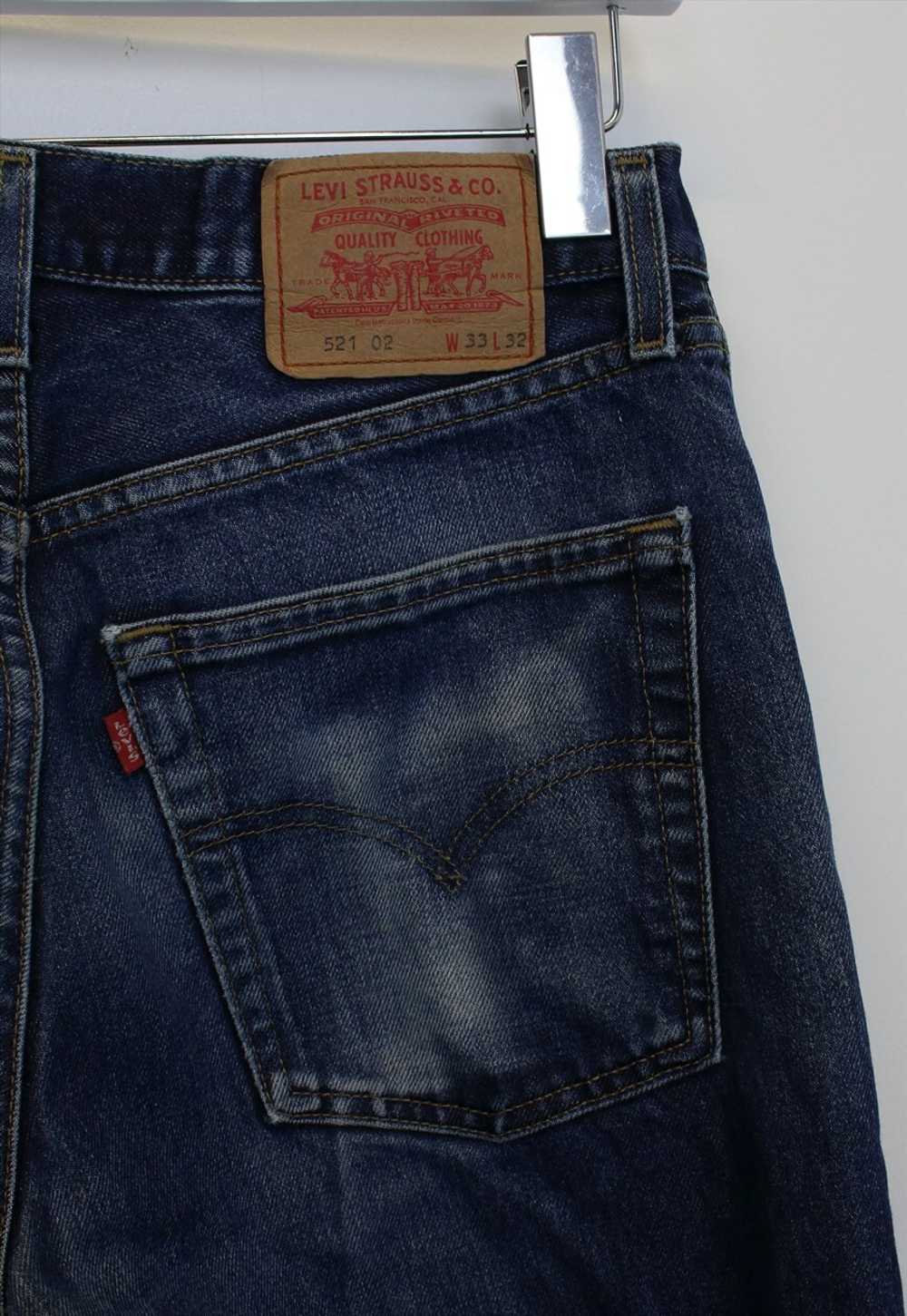 Vintage Levi's jeans in blue. Best fit 33W - image 2