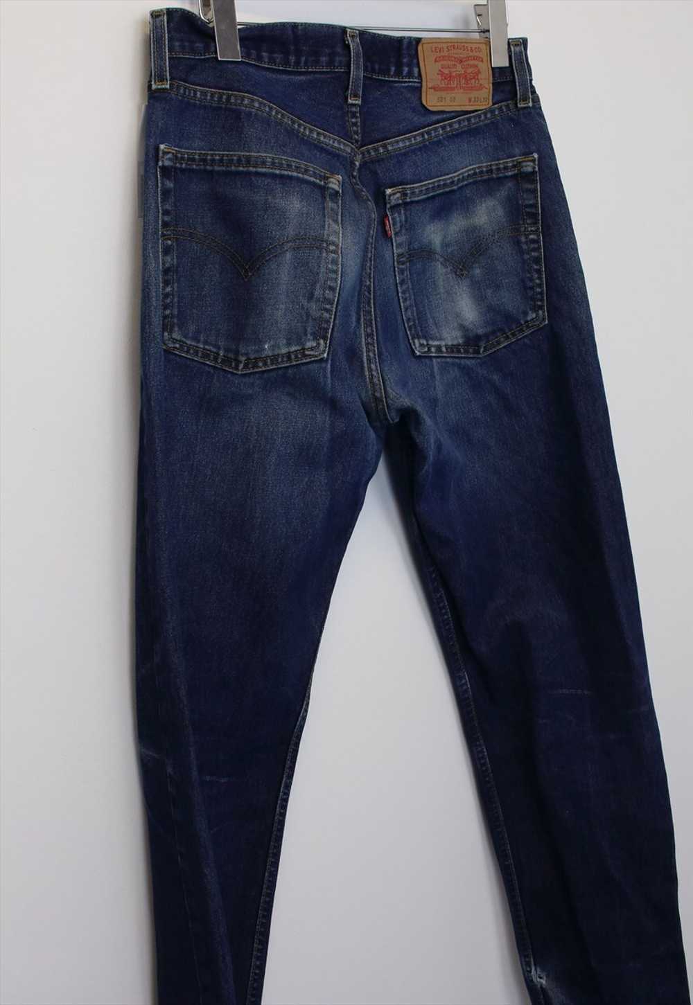 Vintage Levi's jeans in blue. Best fit 33W - image 3