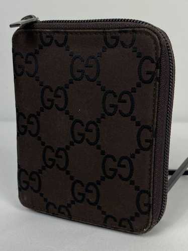 Gucci Gucci GG Canvas monogram zippy wallet