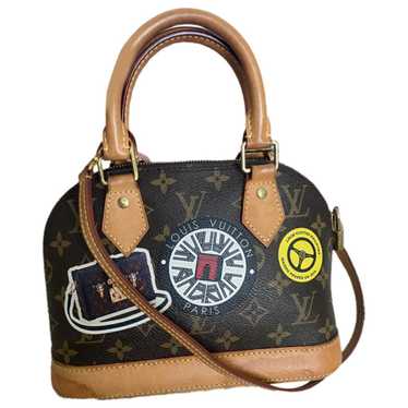 Louis Vuitton Alma cloth handbag