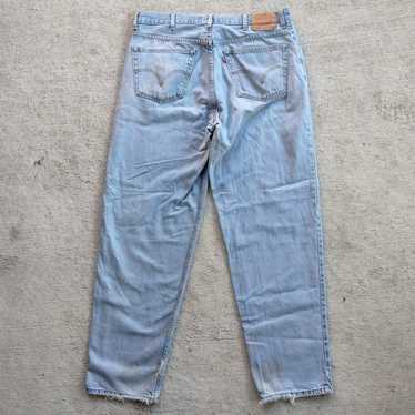 Vintage Levi's 560 Light Washed Denim Jeans