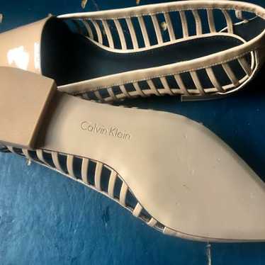 Calvin Klein Elouise Patent Sandstorm color flats 