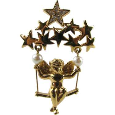 Cherub in Gold Tone Swinging On a Group of Stars - image 1