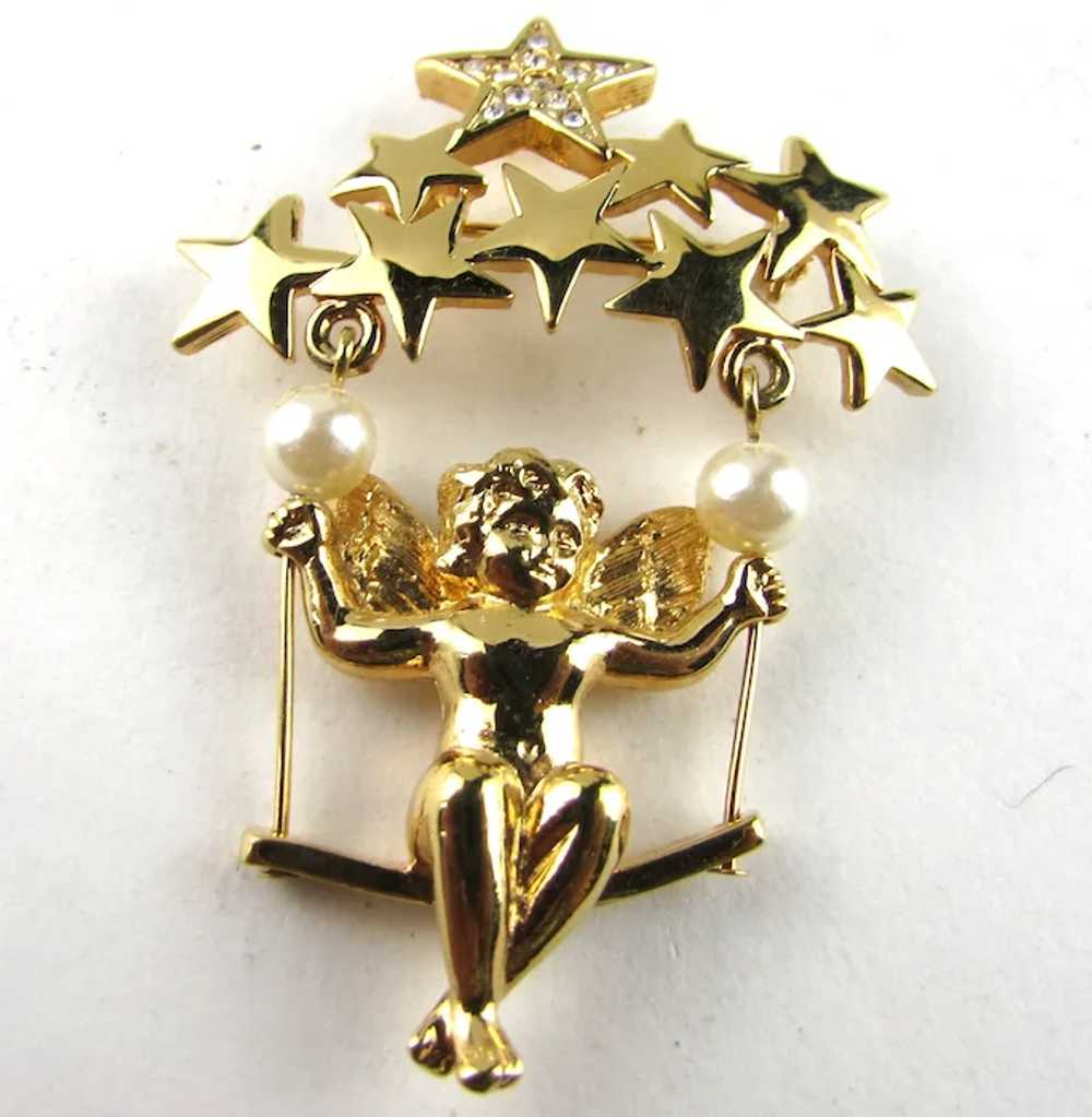 Cherub in Gold Tone Swinging On a Group of Stars - image 2